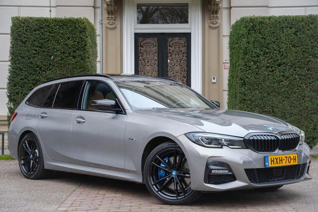 BMW 3-SERIE Touring 330e High Executive TREKHAAK | PANO | KUIPSTOELEN | LASER | ACC | H&K