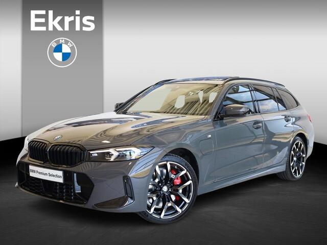 BMW 3-SERIE Touring 330e M Sportpakket Pro | Panoramadak | Elektr. Trekhaak | BMW Individual Dravit Grau Metallic