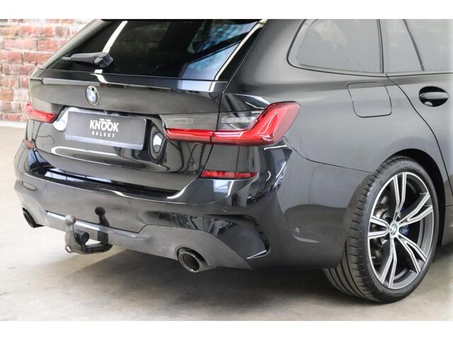 BMW 3-SERIE Touring 330i xDrive High Executive M Sport / Panoramadak / Head-Up Display / Trekhaak / Leder / Apple CarPlay / Harman Kardon / 19 Inch / Laserlicht / M Sportremsysteem / Adaptief M-onderstel