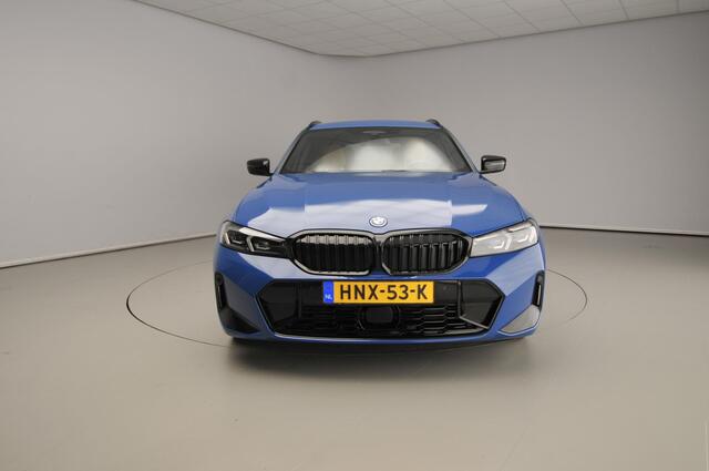 BMW 3-SERIE Touring 330e | Individual Lak | M-Sportpakket | LED | HUD | Trekhaak | Elektr. zetels | DAB | Harman-kardon sound | Alu 19 inch