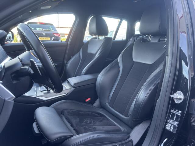 BMW 3-SERIE Touring 318i Business Edition | M Pakket | Sfeerverlichting | Apple Carplay | Parkeercamera