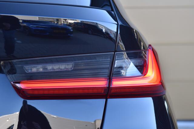 BMW 3-SERIE Touring 320e Business Edition Plus * Laserlicht * Sportstoelen * Servicecontract *