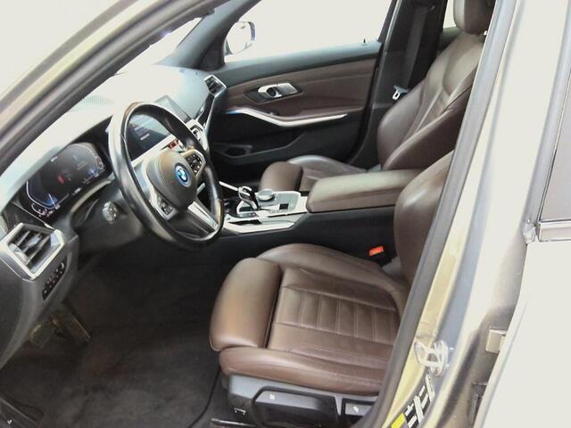 BMW 3-SERIE Touring 320e xDrive Business Edition Plus 1e-Eig. & Dealer-Onderh. BOVAG-Garantie. NL-Auto.