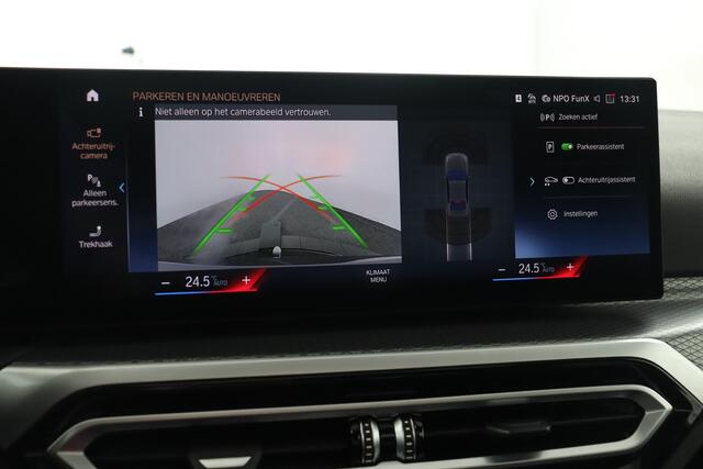 BMW 3-SERIE 320e BMW 320e Sedan M Sport | Glazen Schuif-/kanteldak | Trekhaak Elektrisch | Harman Kardon | Active Cruise Control | Stoelverwarming | 19" M Dubbelspaak | Lentevoordeel