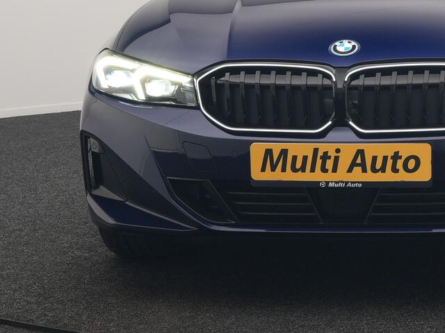 BMW 3-SERIE Touring 320e xDrive PHEV 204pk Dealer O.H. | Trekhaak Af Fabriek | Panodak | Adaptive Cruise | Camera | Lederen Sportstoelen Memory & Verwarmd | Widescreen Navi | Blis | Apple Carplay | DAB | Iconic Glow Grille | Plug In Hybrid |