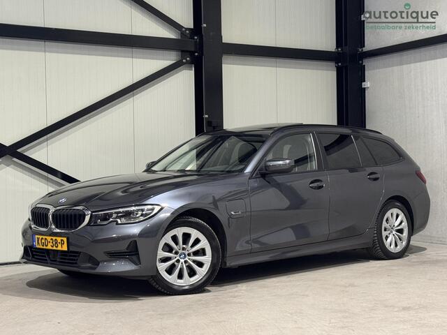 BMW 3-SERIE Touring 320e xDrive Business | panorama | navi | led | trekhaak |