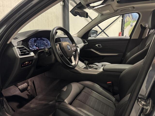 BMW 3-SERIE Touring 320e xDrive Business | panorama | navi | led | trekhaak |