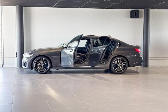 BMW 3-SERIE Sedan M340i xDrive High Executive | Stoelverwarming | Glazen schuif-/kanteldak |
