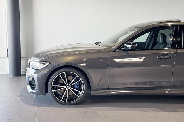 BMW 3-SERIE Sedan M340i xDrive High Executive | Stoelverwarming | Glazen schuif-/kanteldak |