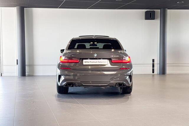 BMW 3-SERIE Sedan M340i xDrive High Executive | Stoelverwarming | Glazen schuif-/kanteldak |
