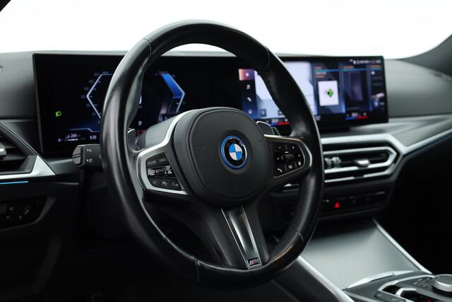 BMW 3-SERIE Touring 320e M Sport | Facelift | Shadow Line | Curved display | Adapt. Cruise | Nav + CarPlay | Elek. Klep | Sfeerverlichting | LED | Stoelverw. | PDC V