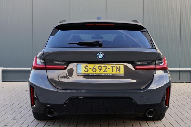 BMW 3-SERIE Touring 320e | M Sport LCI | Dravitgrau | Leer / Alcantara | Trekhaak afn. | 19 Inch | Stoelverwarming | Live Cockpit Plus | M-Pakket
