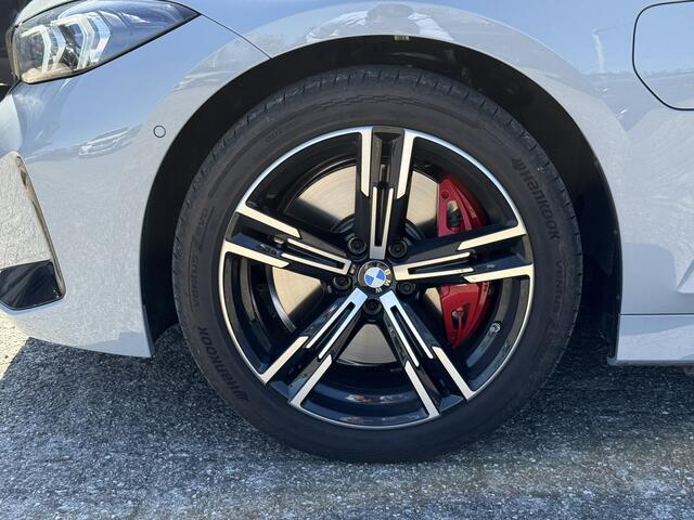 BMW 3-SERIE Touring 330e | M-Sport Pro | Panorama | Camera | Getint Glas | HiFi
