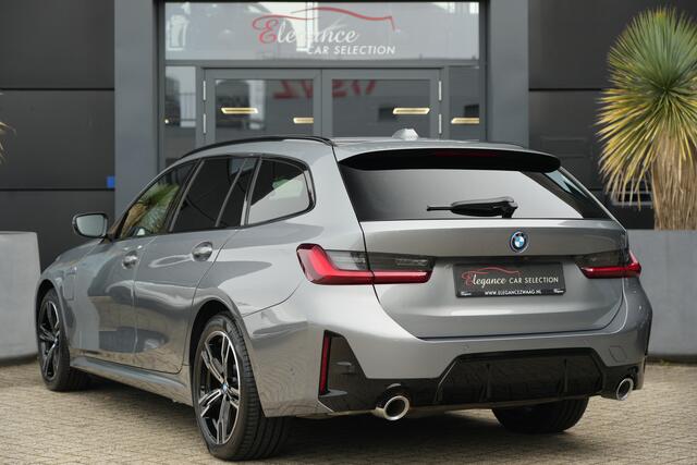 BMW 3-SERIE Touring 330e M Sport High Executive 292pk Navigatie/HUD/360Camera
