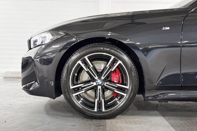 BMW 3-SERIE Sedan 318i | M-Sport Pro | Comfort Pack | Trekhaak | Comfort Access | Harman/Kardon | Stoelverwarming | Huisselectie