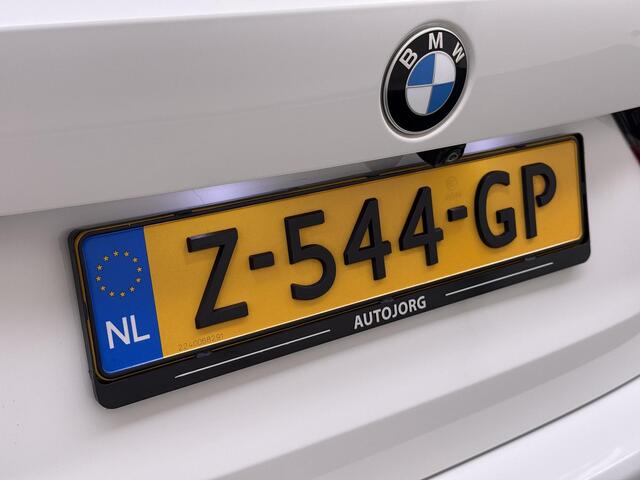 BMW 3-SERIE Touring 330e High Executive Pano | Trekhaak | HUD | Lederen interieur |