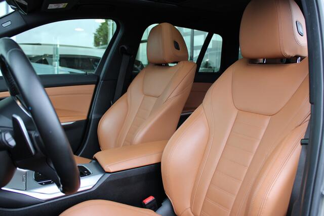 BMW 3-SERIE Touring 330e eDrive High Executive M Sport Automaat / Panoramadak / Sportstoelen / Achteruitrijcamera / LED / Stoelverwarming / Getint glas / Cruise Control