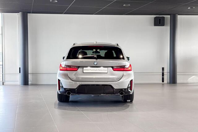 BMW 3-SERIE Touring 330e | M Sport Pro | Glazen Panoramadak | Stoelverwarming | Trekhaak |
