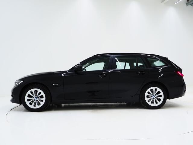 BMW 3-SERIE Touring 320e Shadow Line | Camera | Trekhaak | Leder/Stof | DAB | LED | Cruise | Carplay
