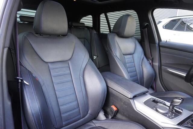 BMW 3-SERIE Touring M340i xDrive High Executive | Parking Pack | Glazen panoramadak | HiFi System | Trekhaak met elektrisch wegklapbare kogel | BMW Head-Up Display | Lentevoordeel