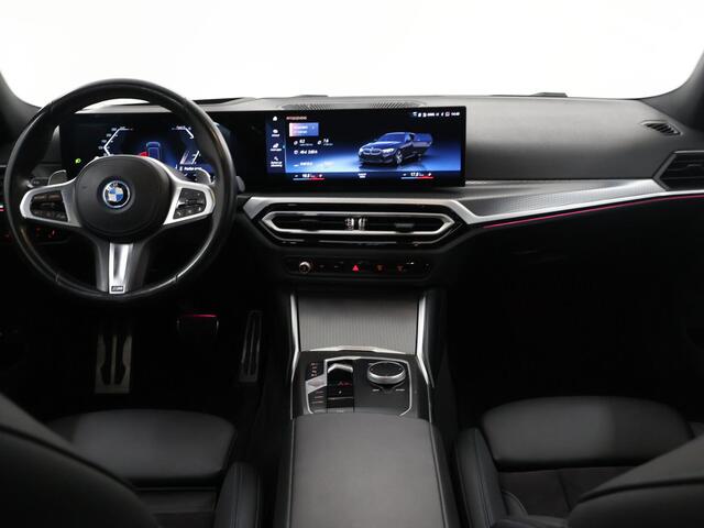 BMW 3-SERIE Touring 320e M-Sport | SOH 97,4% | Facelift | Panoramadak | Elek. Stoelen met Geheugen | HUD | Sportstoelen | 360° Camera | Apple Carplay/Android Auto | Cruise Control | Comfort Pakket | M-Sport Pro | Curved Display |