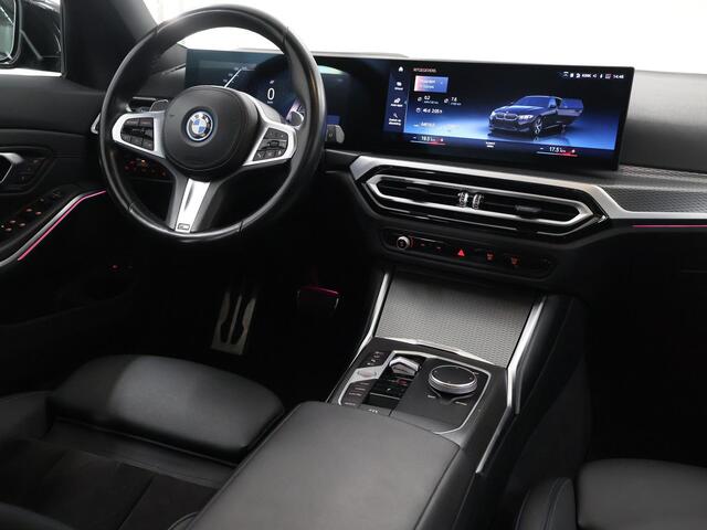 BMW 3-SERIE Touring 320e M-Sport | SOH 97,4% | Facelift | Panoramadak | Elek. Stoelen met Geheugen | HUD | Sportstoelen | 360° Camera | Apple Carplay/Android Auto | Cruise Control | Comfort Pakket | M-Sport Pro | Curved Display |