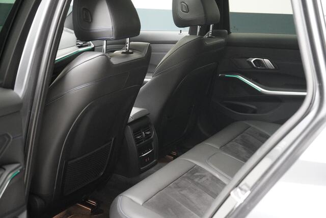 BMW 3-SERIE Touring 330e High Executive | SoH 90% | Panoramadak | Trekhaak | Memory | Stuurverwarming | Carplay | Stoelverwarming