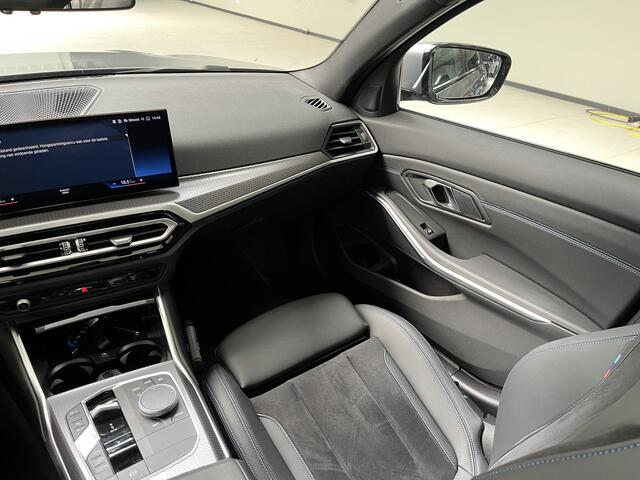BMW 3-SERIE 320e | M-Sport Pro | Schuif/-kanteldak | Stoelverwarming | 19inch | HiFi | Camera