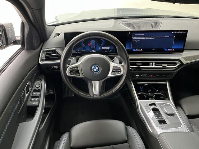BMW 3-SERIE 320e | M-Sport Pro | Schuif/-kanteldak | Stoelverwarming | 19inch | HiFi | Camera