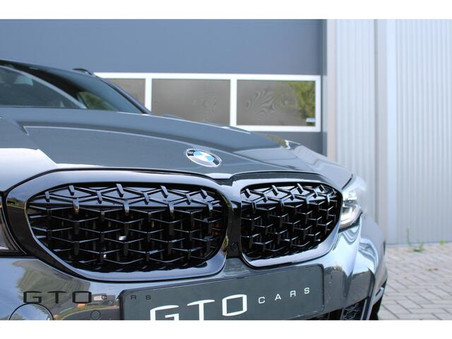 BMW 3-SERIE Touring 330i M Sport | Pano | Apple Carplay | Sfeerverlichting | LED | Stoelverwarming