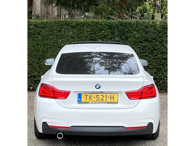 BMW 4-SERIE 418i high excecutive NL Aut Leder Carplay M-sport Head up