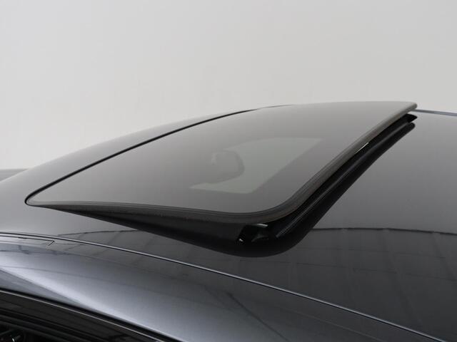 BMW 4-SERIE Coupé 418i M Sport | Schuifdak | Leder | Stoelverwarming | 20'' | Sportstoelen | Full LED | Navigatie | Parkeerhulp | Climate control | Cruise control | 74.200km NAP