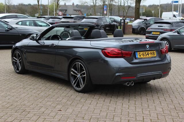 BMW 4-SERIE Cabrio 420i High Executive Ed. M Sport / Camera / Leder / Harman Kardon / Nekverwarming / 19'' / Navigatie / Windscherm / DAB / Stoelverwarming / Cruise Control