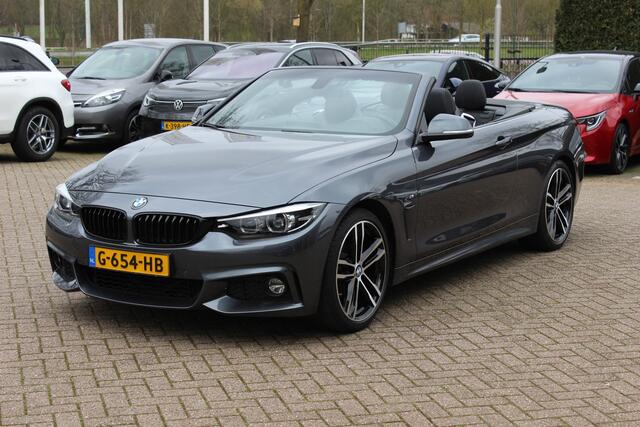 BMW 4-SERIE Cabrio 420i High Executive Ed. M Sport / Camera / Leder / Harman Kardon / Nekverwarming / 19'' / Navigatie / Windscherm / DAB / Stoelverwarming / Cruise Control