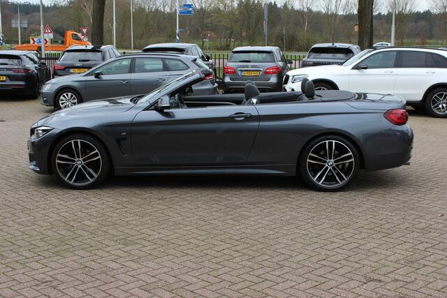 BMW 4-SERIE Cabrio 420i High Executive Ed. M Sport / Camera / Leder / Harman Kardon / Nekverwarming / 19'' / Navigatie / Windscherm / DAB / Stoelverwarming / Cruise Control