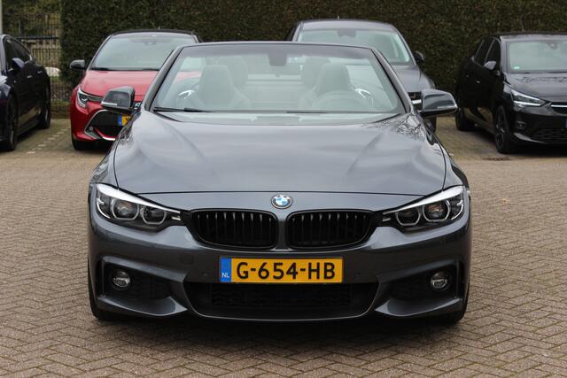 BMW 4-SERIE Cabrio 420i High Executive Ed. M Sport / Camera / Leder / Harman Kardon / Nekverwarming / 19'' / Navigatie / Windscherm / DAB / Stoelverwarming / Cruise Control