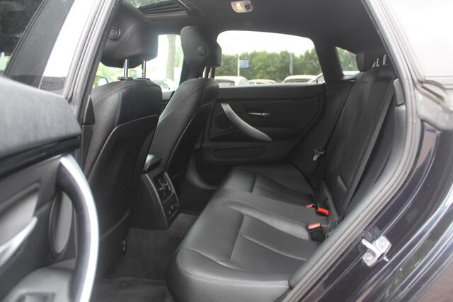 BMW 4-SERIE Gran Coupé 430i High Exe. M Sport / Schuifdak / Camera / Head-up / Harman Kardon / 19'' / Leder / Navigatie / Dodehoek / DAB / Stoelverwarming / Cruise Control