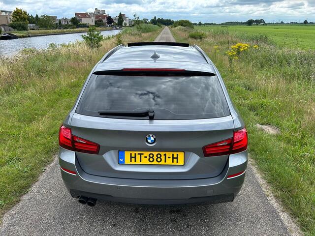 BMW 5-SERIE Touring 520i High Executive M-Pakket / Panoramadak VOL!