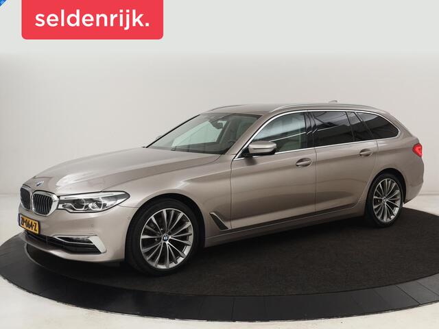 BMW 5-SERIE 520i High Executive | Luxury Line | Leder | Trekhaak | Camera | Stoelverwarming | 19'' | Sfeerverlichting | Memory | Carplay | Navigatie | Park Assist | Full LED