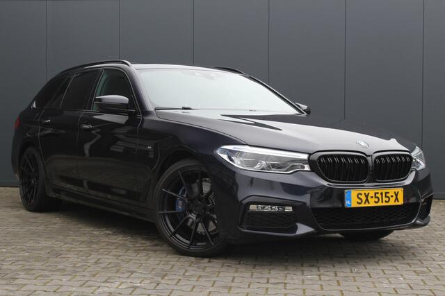 BMW 5-SERIE Touring 530i High Executive M-sport | Incl. 12 maanden garantie | Panoramadak | Dodehoek detectie | Geheugenstoelen | Parkeercamera | Standkachel | Head-up display | Elektrisch uitklapbare trekhaak | Stoelverwarming | Draadloze telefoonlader | Luxe leder