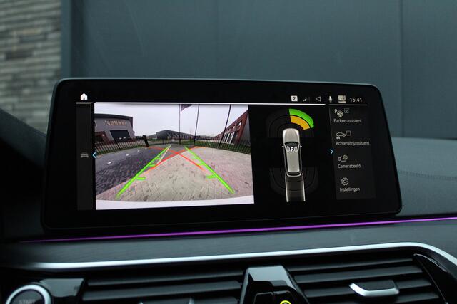 BMW 5-SERIE Touring 520e High Executive - Laser - Memory - HUD - Achteras besturing - Stoel/Stuur verwarming - ACC - Keyless - Rijklaar