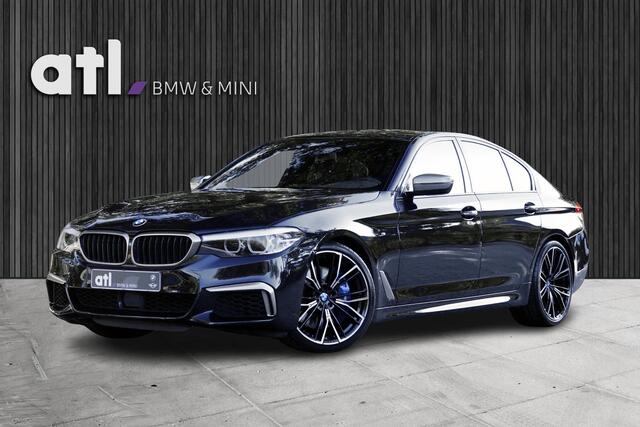 BMW 5-SERIE M550i xDrive Executive M-Sport | Merino leder | 20" | Driving Assistent Plus | Comfort stoel met geheugen | Real-Time Traffic information | Zonnerolgordijnen achter | Stoelverwarming voor en achter | Etc.
