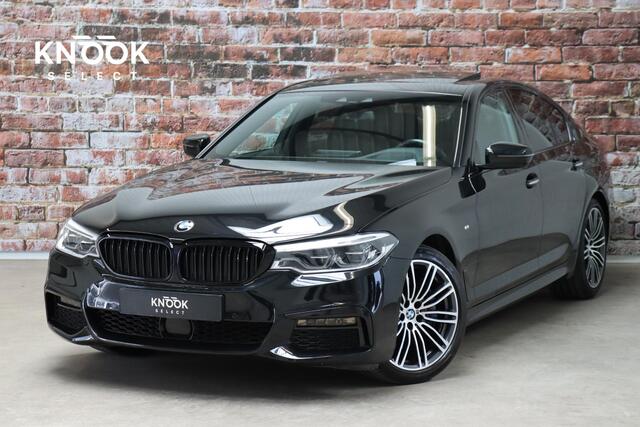 BMW 5-SERIE 530i High Executive M Sport Pakket Automaat / Navigatiesysteem Professional / Schuif-/kanteldak / Harman Kardon / Stoelverwarming / Adaptieve Cruise Control / Apple Carplay / Achteruitrijcamera / Stuurwielverwarming / Head-Up Display / Trekhaak /