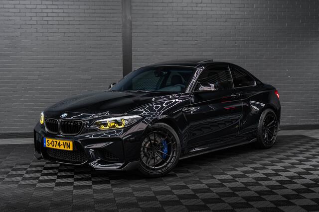 BMW M2 2-serie Coupé DCT | NOVA PERFORMANCE 19 INCH CUSTOM WHEELS | CS STOELEN | CS STUUR | CARBON INTERIEUR EN EXTERIEUR| voorzien van Target Blu Eye 2 en Laser Track Flare