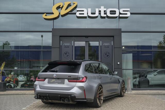BMW M3 Touring Competition 510pk xDrive Widescreen Frozen grey *BTW* Head-up Adaptive cruise CSL grille 21" LMV