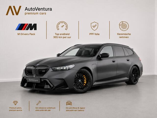 BMW M5 5-serie Touring l M drivers package l Stoelkoeling l Carbon | B&W Surround Audio | Trekhaak |