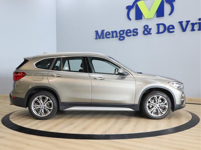 BMW X1 sDrive20i Orange Edition II Trekhaak | Stoelverwarming | LED | NAP | Head-Up display | Leder | Isofix