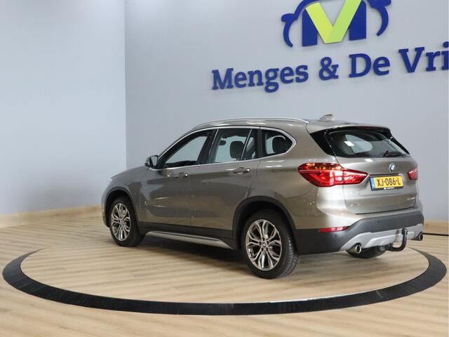 BMW X1 sDrive20i Orange Edition II Trekhaak | Stoelverwarming | LED | NAP | Head-Up display | Leder | Isofix