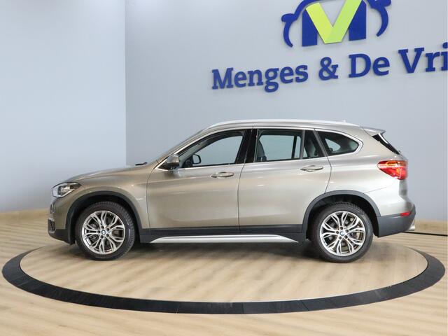BMW X1 sDrive20i Orange Edition II Trekhaak | Stoelverwarming | LED | NAP | Head-Up display | Leder | Isofix
