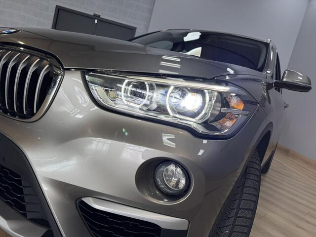 BMW X1 sDrive20i Orange Edition II Trekhaak | Stoelverwarming | LED | NAP | Head-Up display | Leder | Isofix